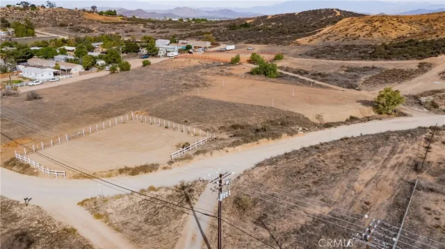 a view of a town with mountains in the background