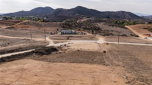 a view of a town with mountains