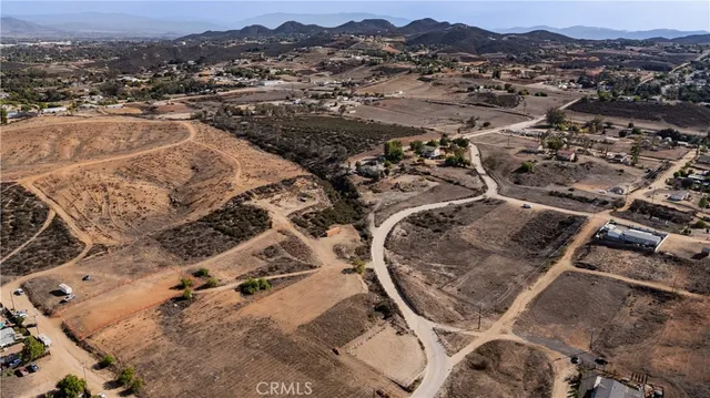 an aerial view of residential house and outdoor space