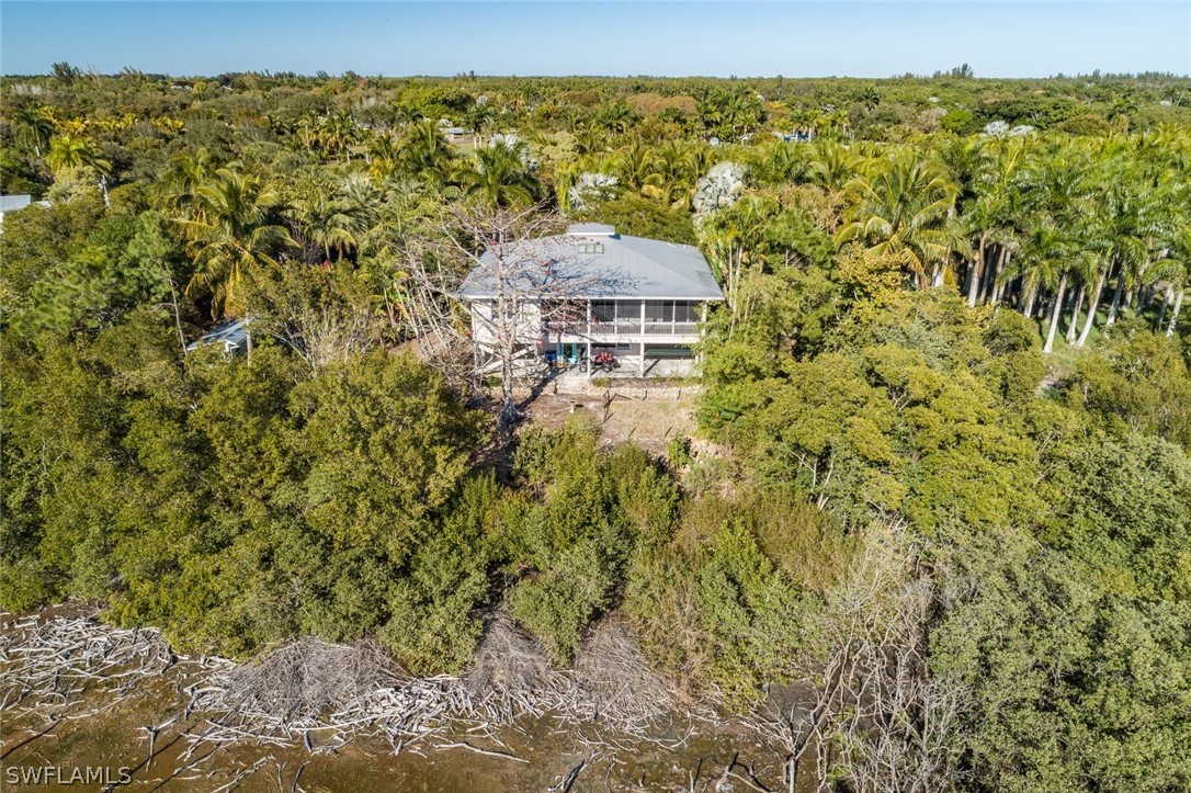 7231 Pineland Road Bokeelia, FL 33922 - Photo 15 of 24 a view of a field with an ocean view