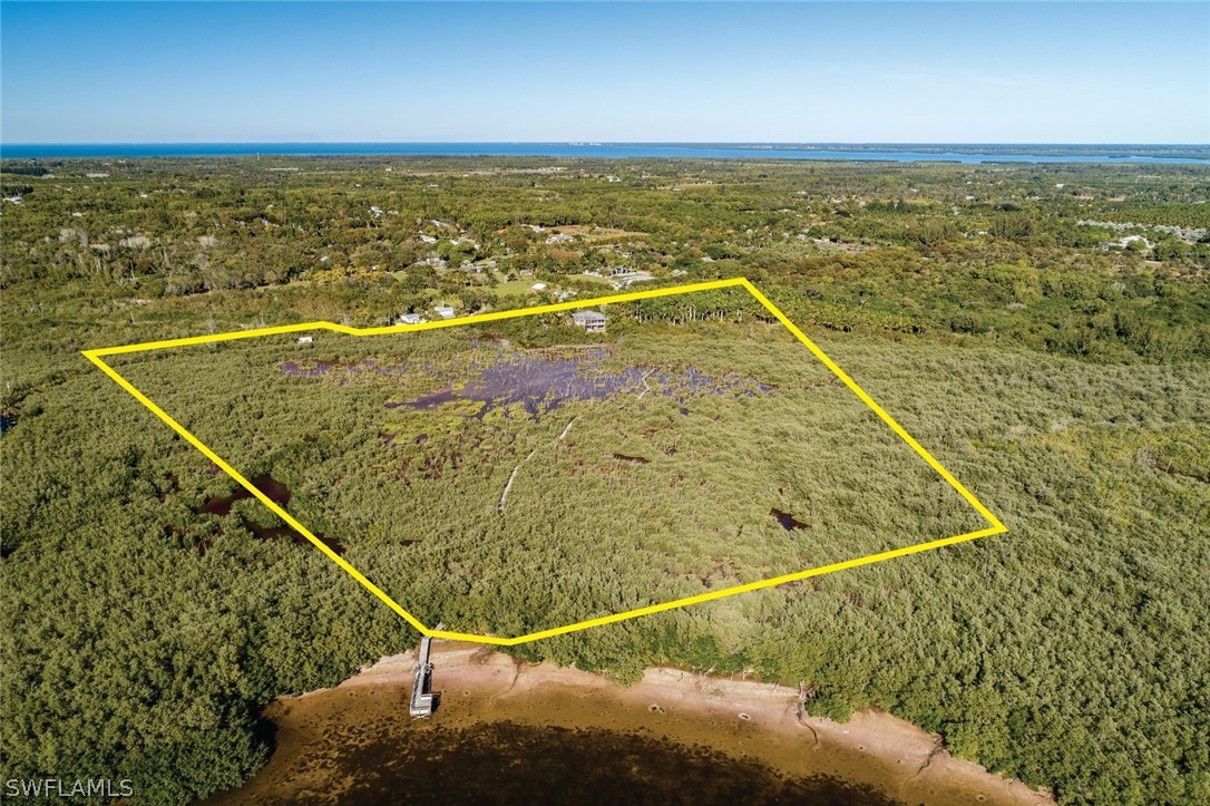 7231 Pineland Road Bokeelia, FL 33922 - Photo 20 of 24 a view of a pool