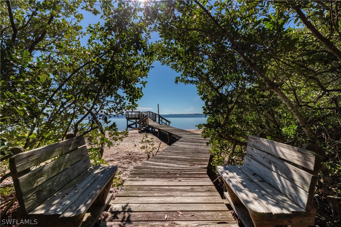 7231 Pineland Road Bokeelia, FL 33922 - Photo 5 of 24 a view of a backyard with of a house