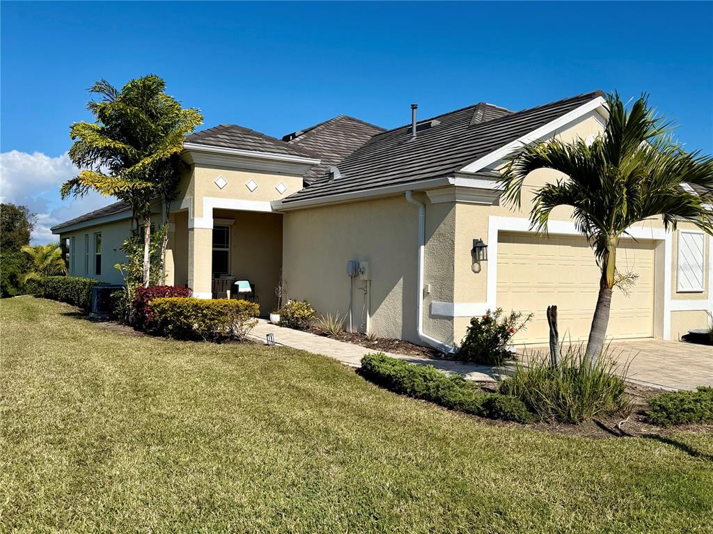 3105 Trustee Avenue Sarasota, FL 34243 - Photo 1 of 19 a view of a house with a patio