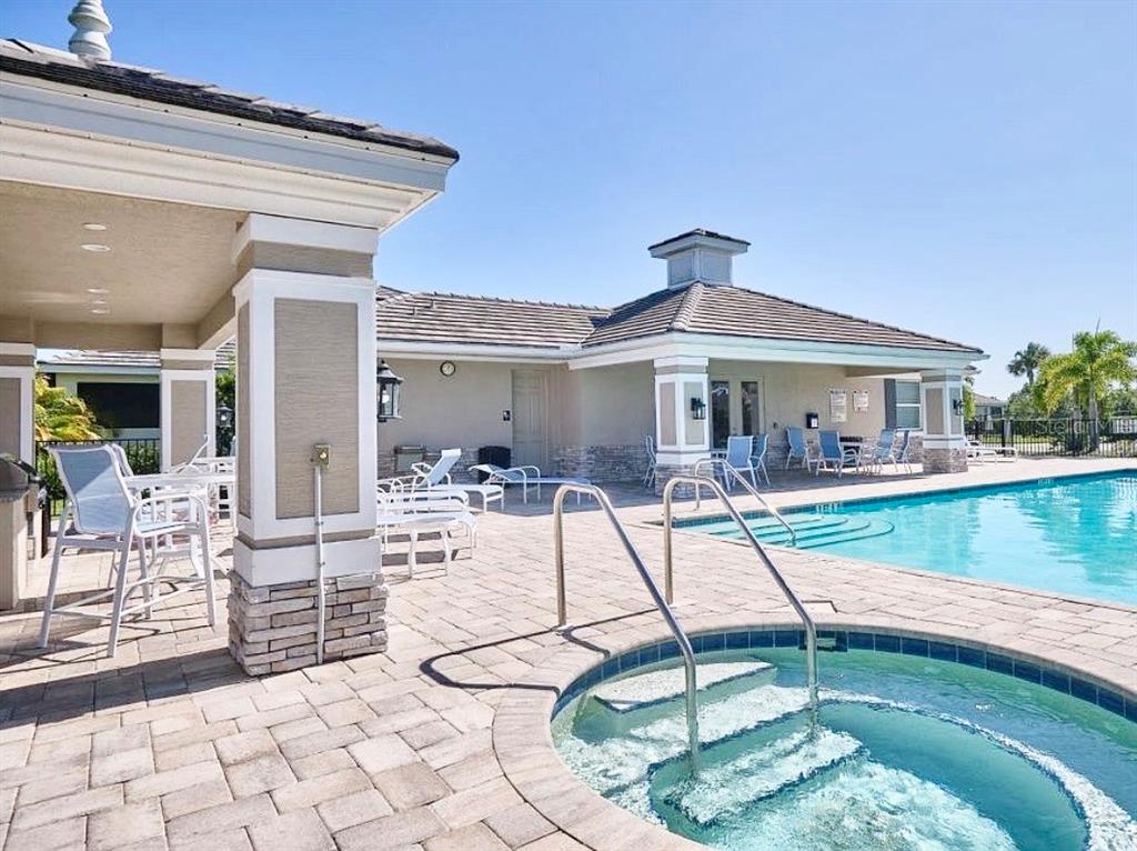 3105 Trustee Avenue Sarasota, FL 34243 - Photo 19 of 19 a view of a swimming pool with chairs