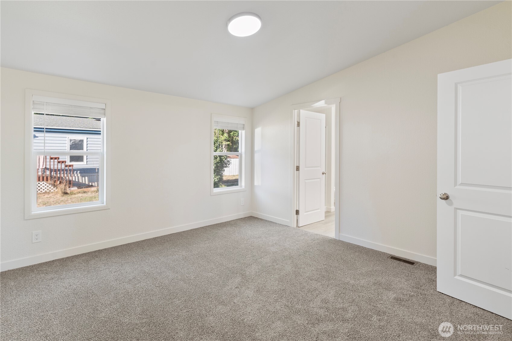 10324 Delphi Road Southwest, Unit 17 Olympia, WA 98512 - Photo 11 of 24 an empty room with windows and closet
