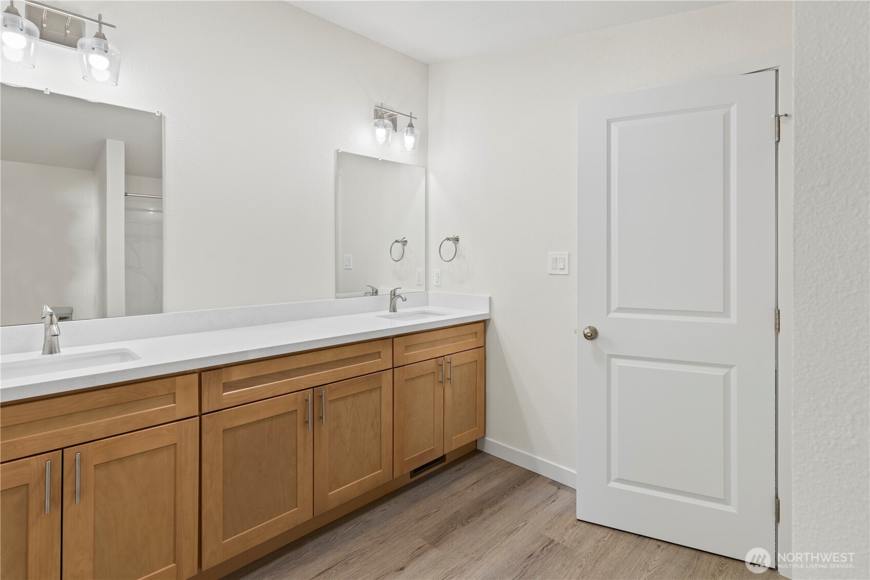 10324 Delphi Road Southwest, Unit 17 Olympia, WA 98512 - Photo 13 of 24 a bathroom with a double vanity sink and mirror
