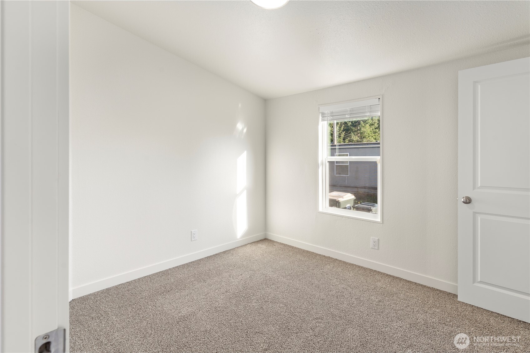 10324 Delphi Road Southwest, Unit 17 Olympia, WA 98512 - Photo 17 of 24 an empty room with window
