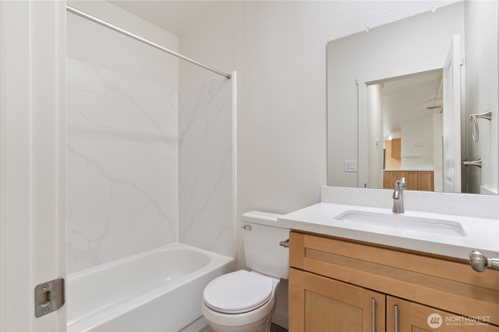 10324 Delphi Road Southwest, Unit 17 Olympia, WA 98512 - Photo 20 of 24 a bathroom with a sink toilet vanity and shower