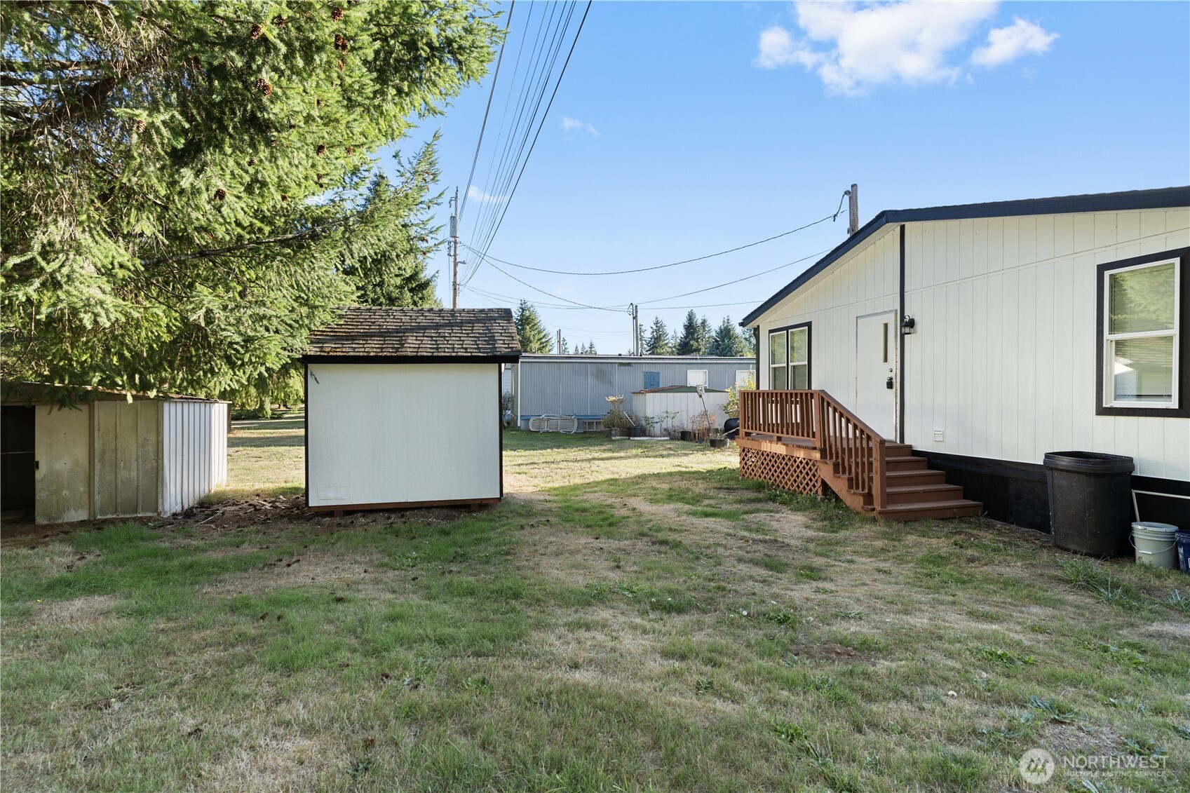 10324 Delphi Road Southwest, Unit 17 Olympia, WA 98512 - Photo 23 of 24 a view of a house with a yard