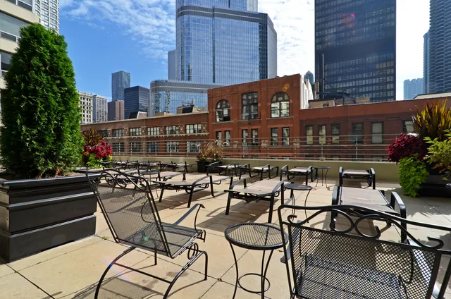 a view of a chairs and tables on the terrace