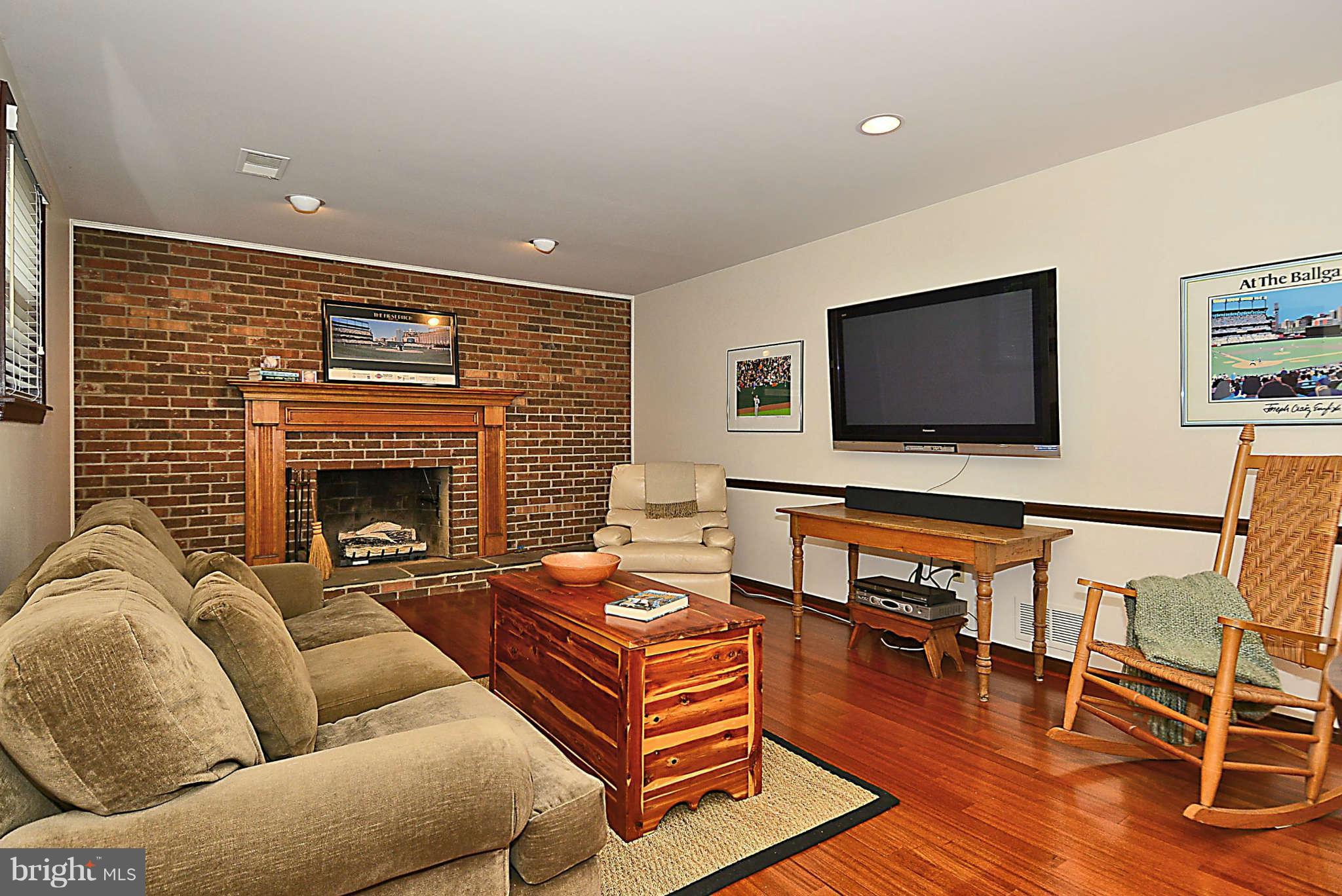 8229 Hilton Road Gaithersburg, MD 20882 - Photo 23 of 30 Fabulous Focal Wall with Gas Log Fireplace