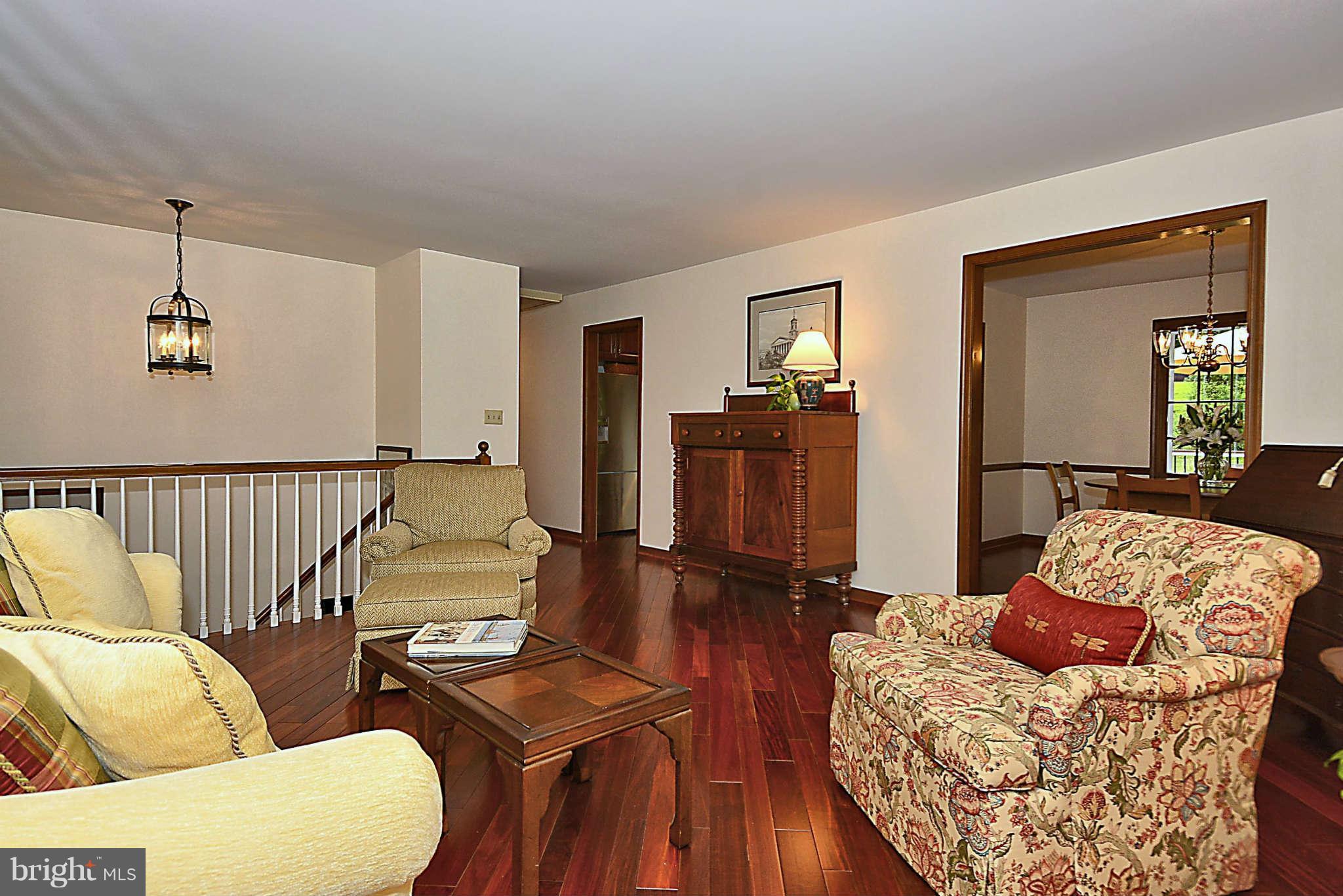 8229 Hilton Road Gaithersburg, MD 20882 - Photo 8 of 30 Living Room View to Foyer and Dining Room