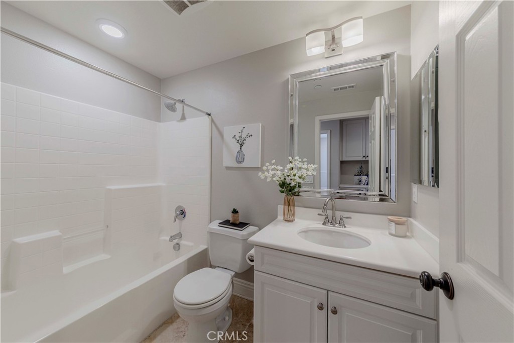 140 Full Moon Irvine, CA 92618 - Photo 18 of 38 a bathroom with a sink toilet and shower