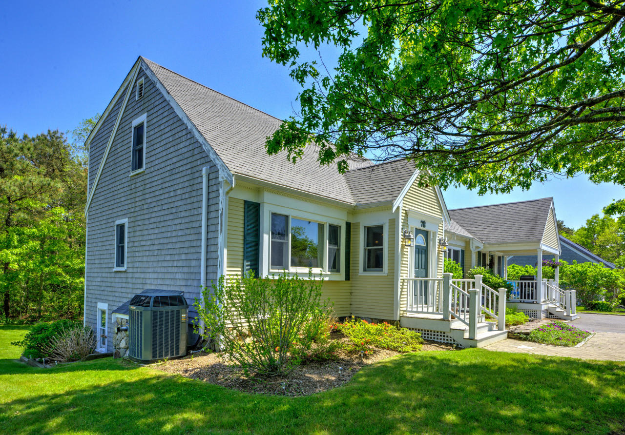 22 Chase Road Edgartown, MA 02539 - Photo 1 of 35 front view of a house with a yard