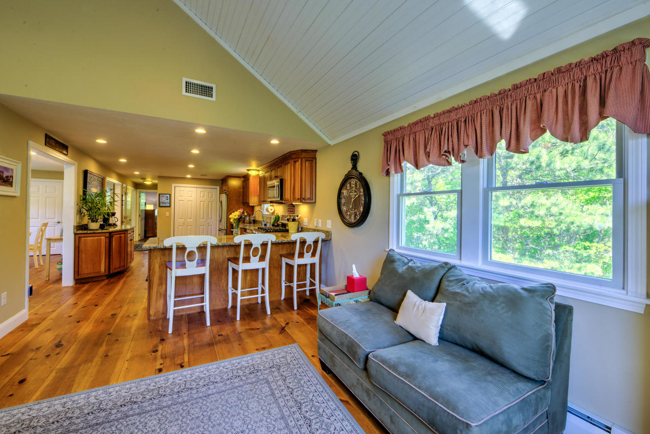 22 Chase Road Edgartown, MA 02539 - Photo 15 of 35 a living room with furniture and a large window
