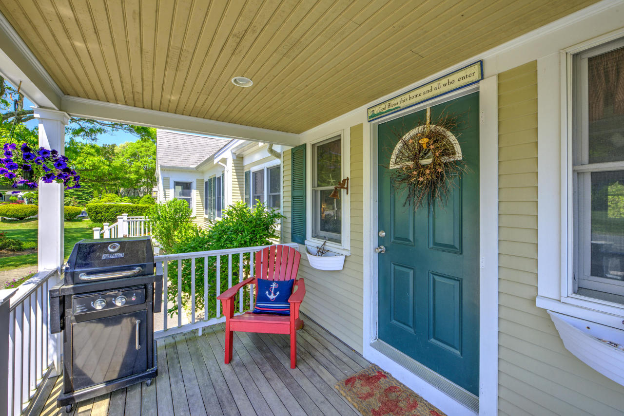22 Chase Road Edgartown, MA 02539 - Photo 17 of 35 a view of a porch with furniture
