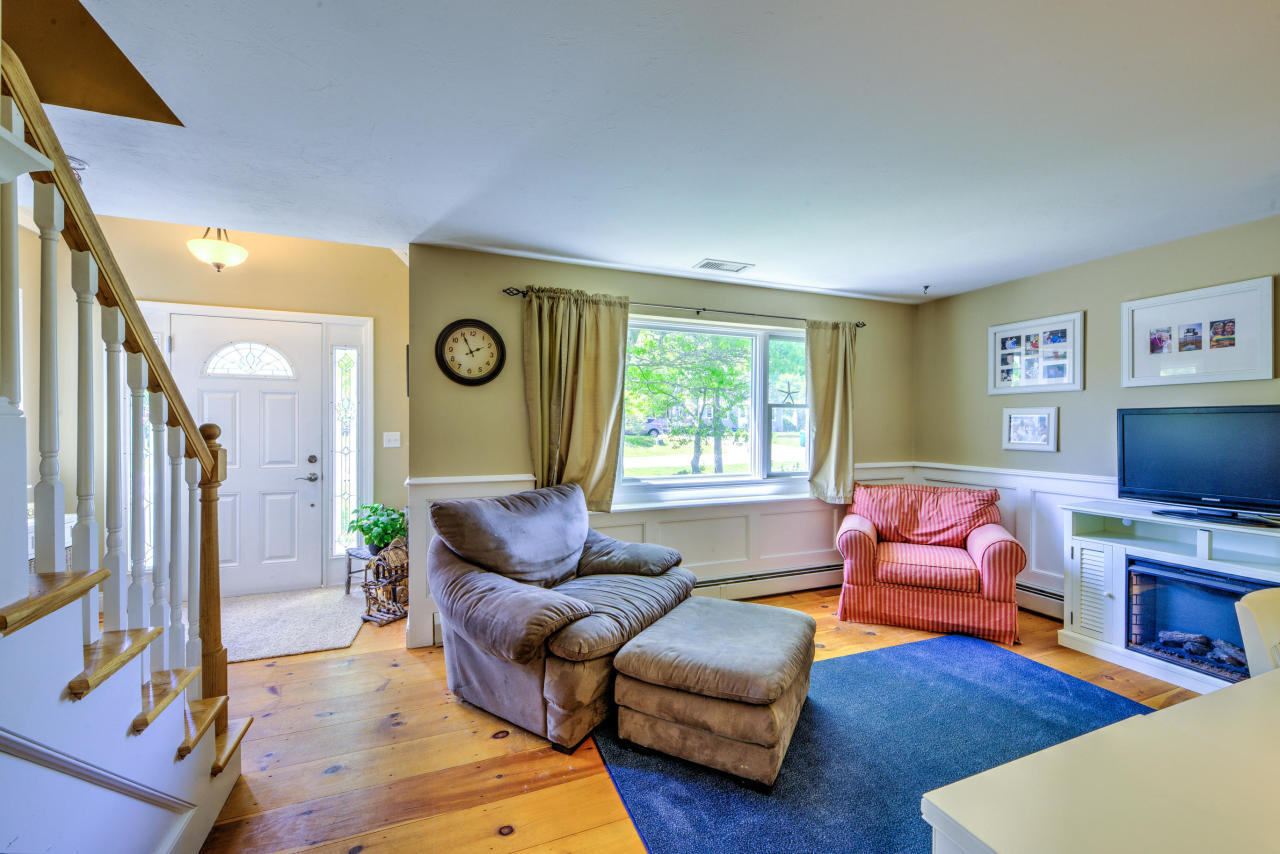 22 Chase Road Edgartown, MA 02539 - Photo 20 of 35 a living room with furniture and a flat screen tv