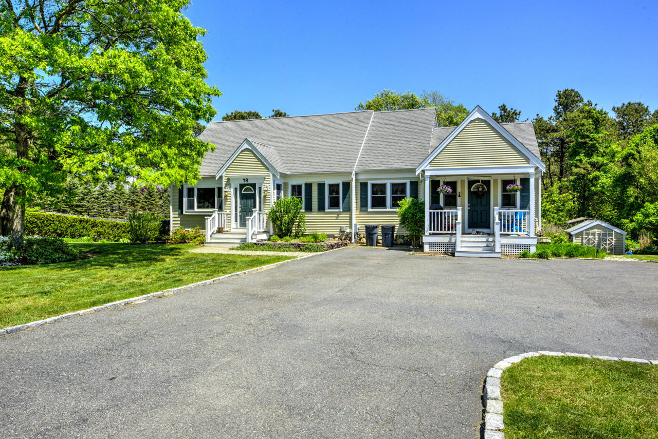 22 Chase Road Edgartown, MA 02539 - Photo 2 of 35 front view of a house with a yard