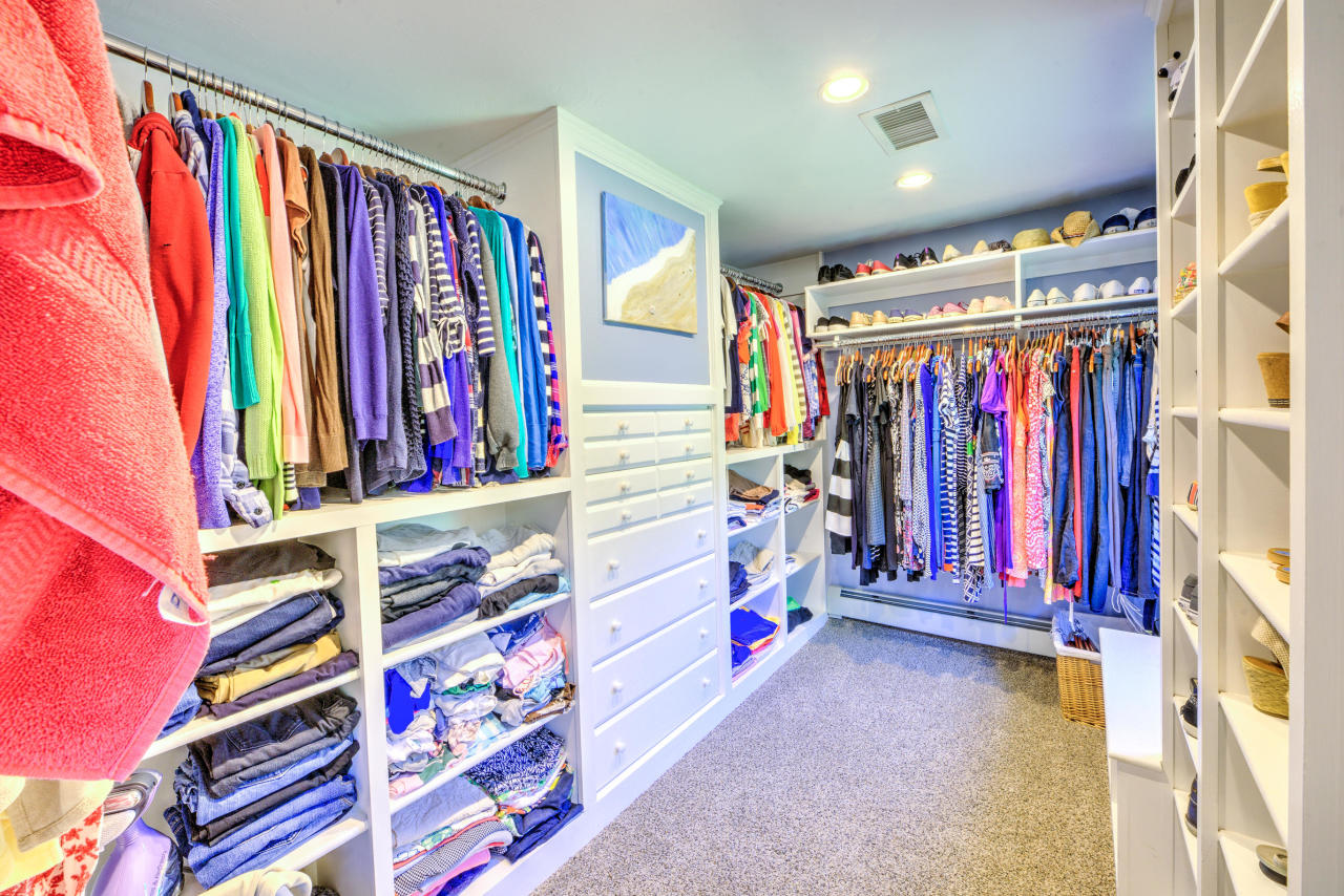 22 Chase Road Edgartown, MA 02539 - Photo 27 of 35 a view of walk in closet with clothes and shoes