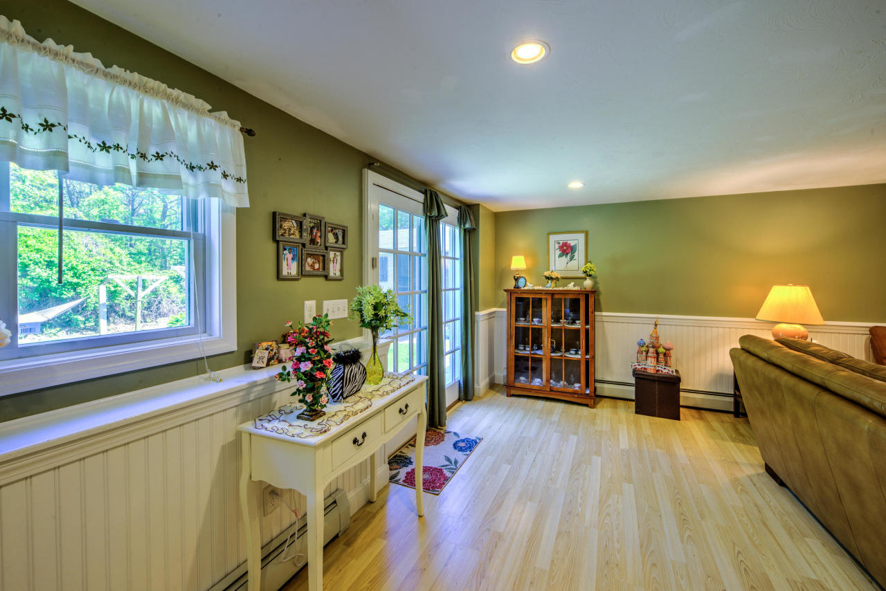 22 Chase Road Edgartown, MA 02539 - Photo 28 of 35 a living room with furniture and a large window
