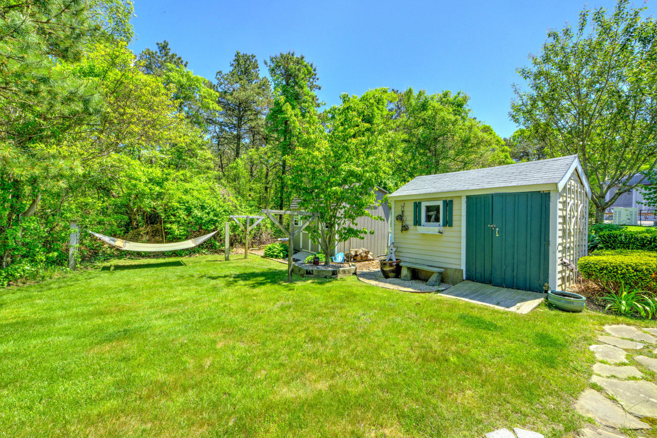 22 Chase Road Edgartown, MA 02539 - Photo 7 of 35 a view of a house with a yard