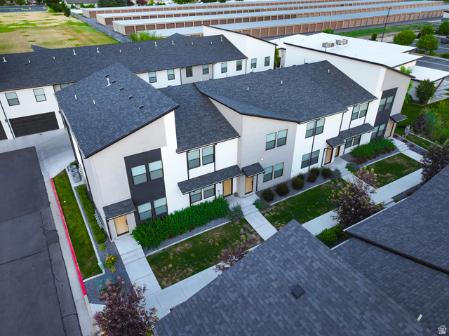 220 Spring Creek Parkway Providence, UT 84332 - Photo 1 of 26 Contemporary townhomes featuring multi-tone facades and individual entrances