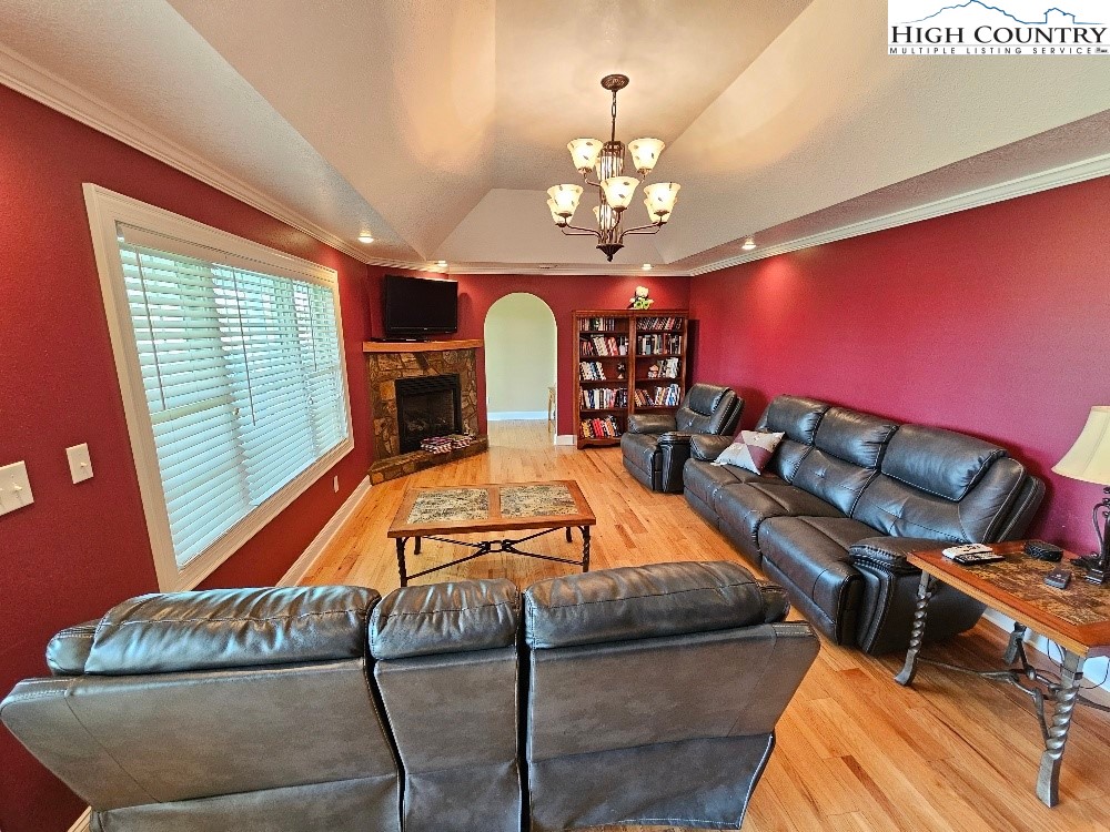 611 Barrett Road Ennice, NC 28623 - Photo 15 of 45 a view of a room with furniture chandelier and window