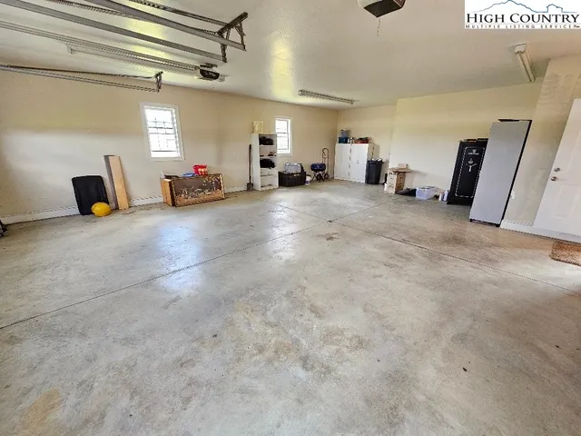 a view of a porch with wooden floor and stairs