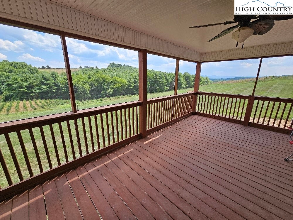 611 Barrett Road Ennice, NC 28623 - Photo 43 of 45 a view of a balcony with wooden floor