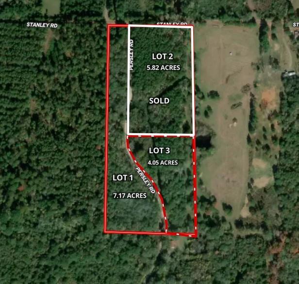 0 Persley Road Stonewall, LA 71078 - Photo 2 of 26 a sign that is sitting on a brick wall