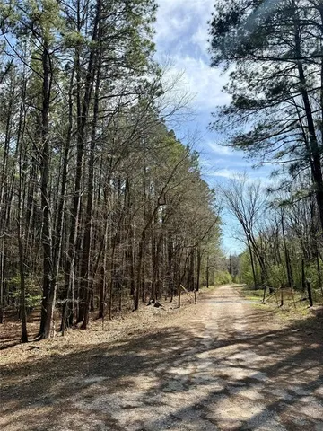 a view of road with trees