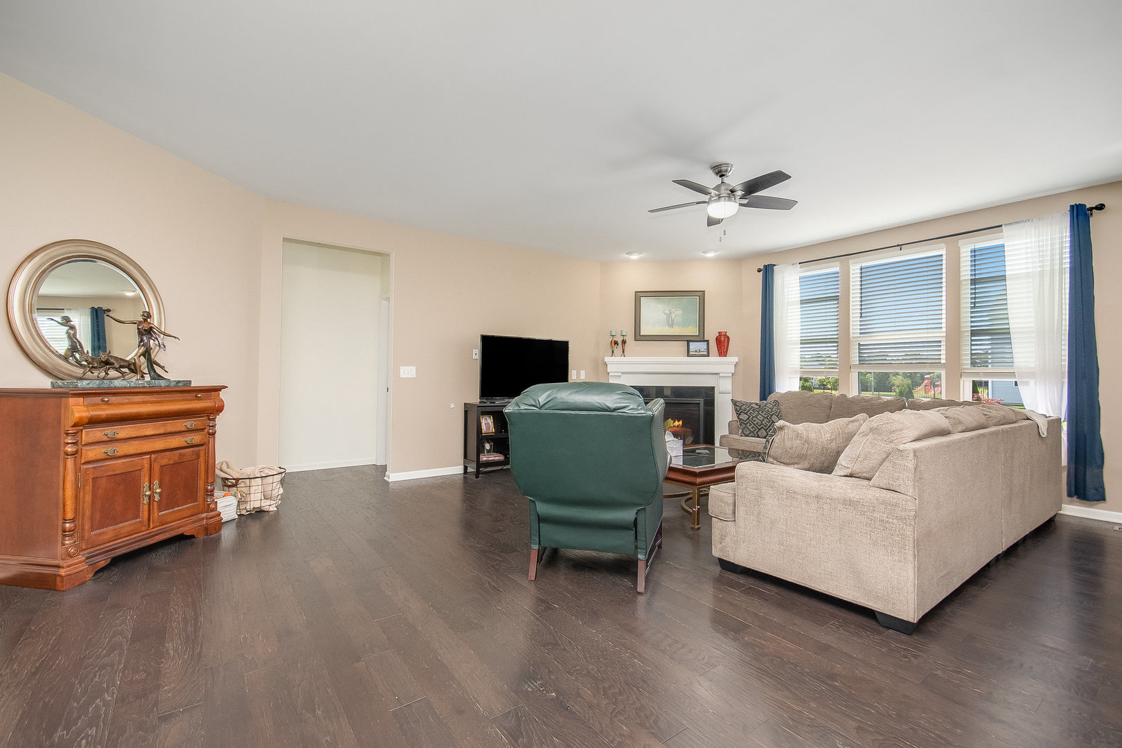 1403 Ruby Drive Yorkville, IL 60560 - Photo 17 of 32 a living room with furniture and a fireplace