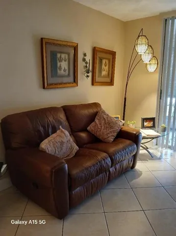 a living room with a couch and a table