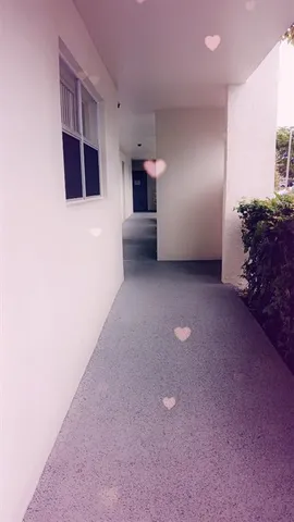 a view of a livingroom with furniture