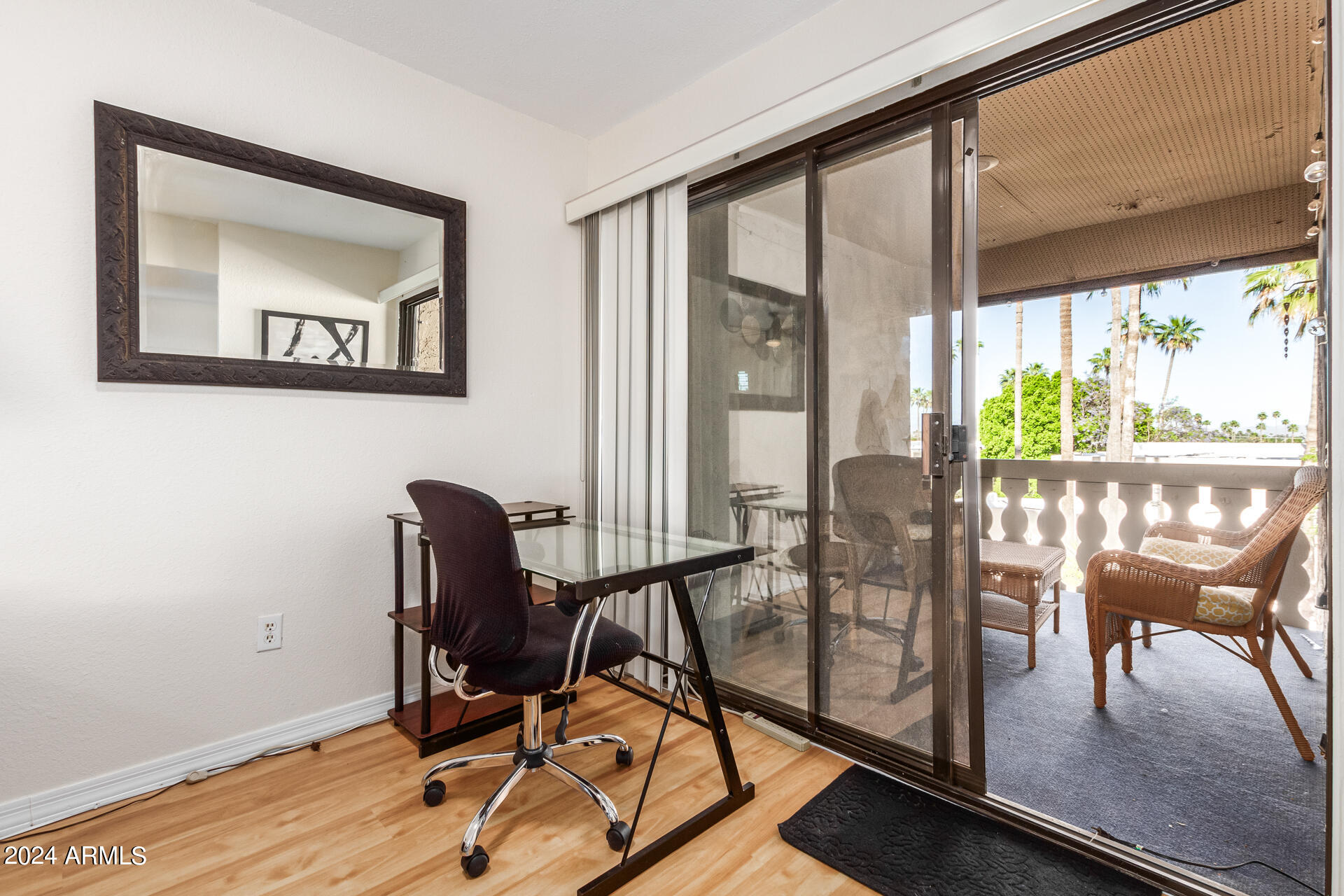 4950 North Miller Road, Unit 347 Scottsdale, AZ 85251 - Photo 11 of 31 a view of a workspace with furniture and a window