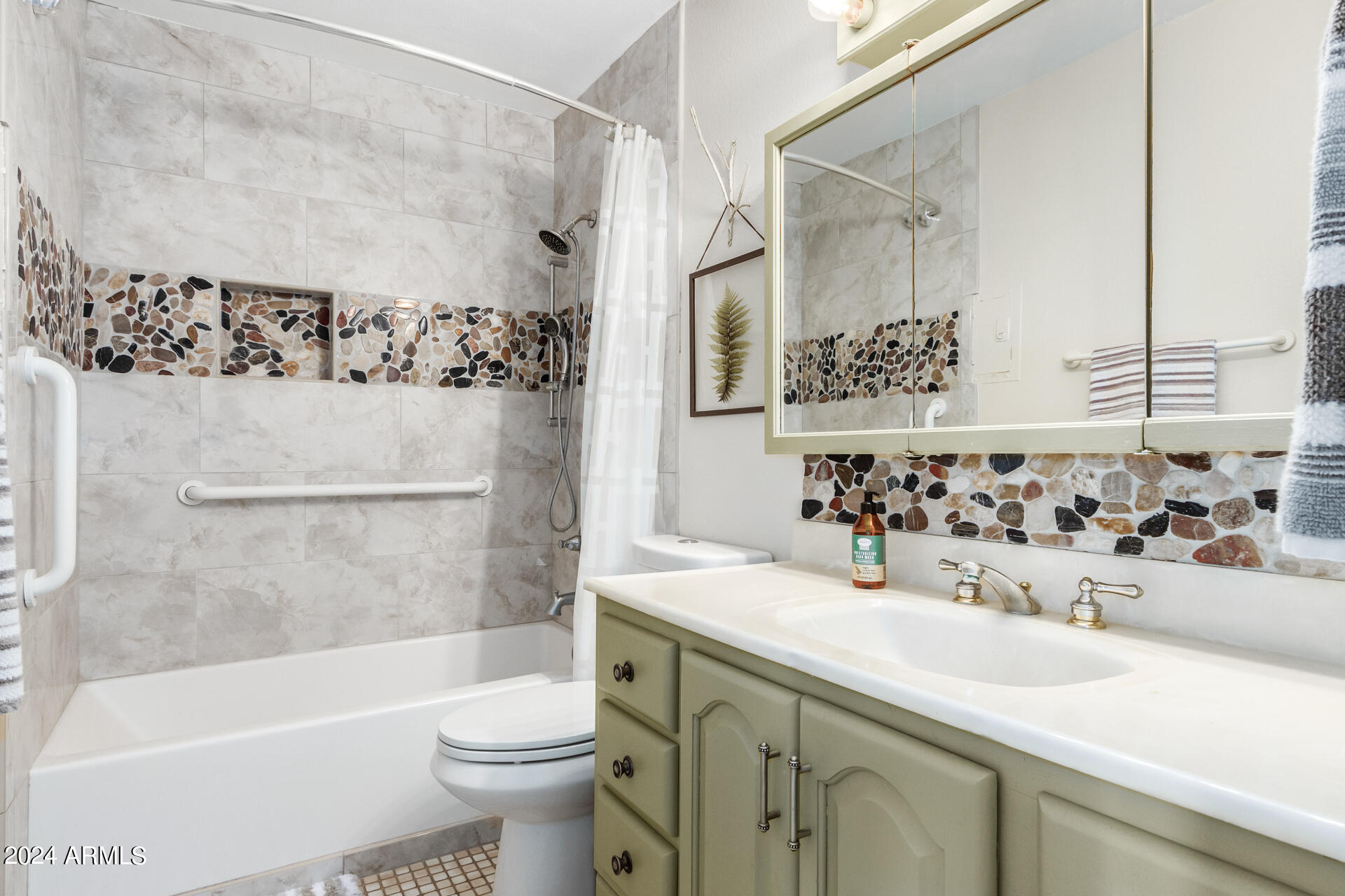 4950 North Miller Road, Unit 347 Scottsdale, AZ 85251 - Photo 12 of 31 a bathroom with a sink and a mirror