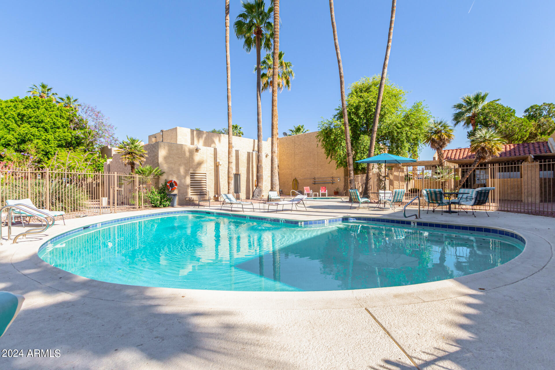 4950 North Miller Road, Unit 347 Scottsdale, AZ 85251 - Photo 21 of 31 a view of outdoor space yard swimming pool and patio