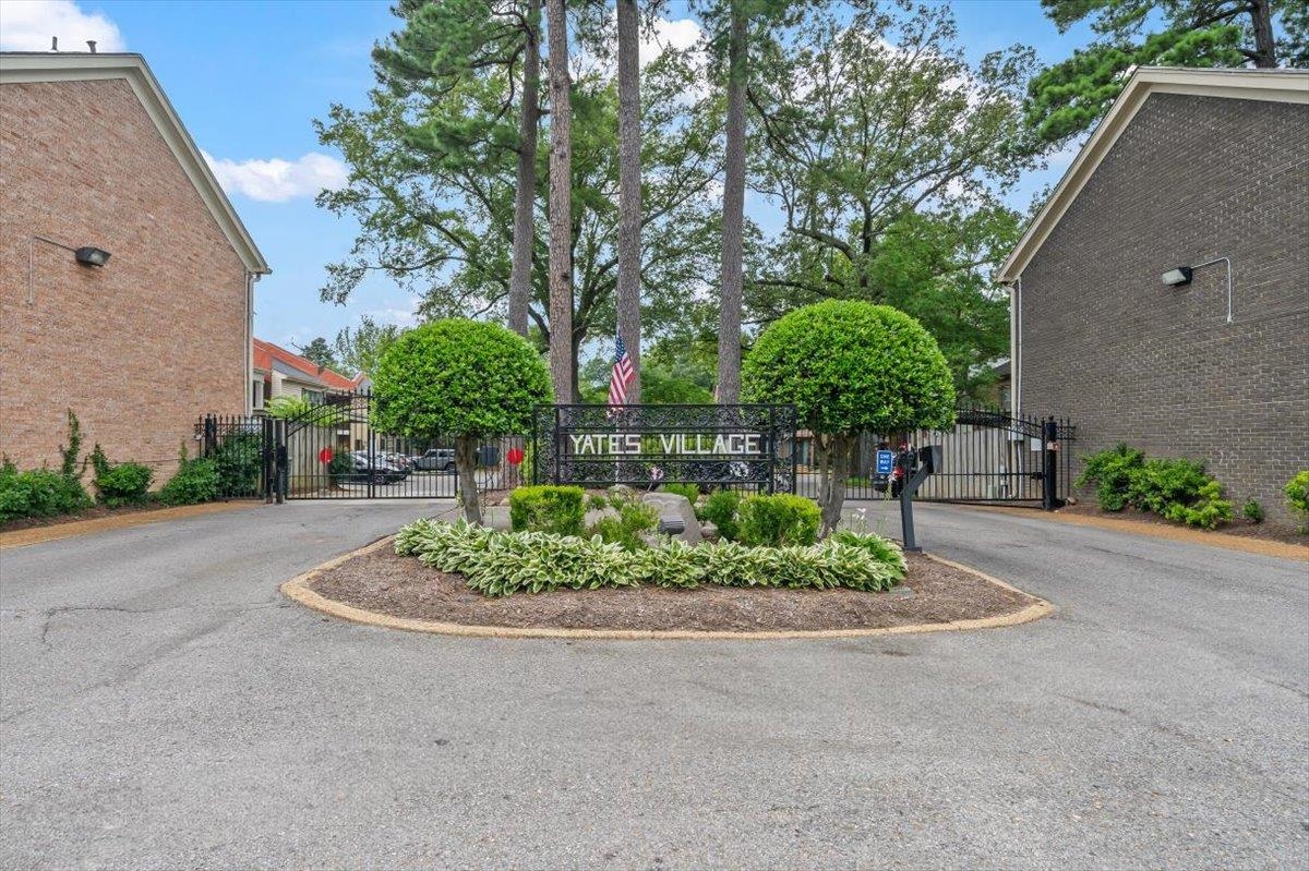 875 South Yates Road, Unit 4 Memphis, TN 38120 - Photo 2 of 25 Yates Village featuring a gate and a gated entry