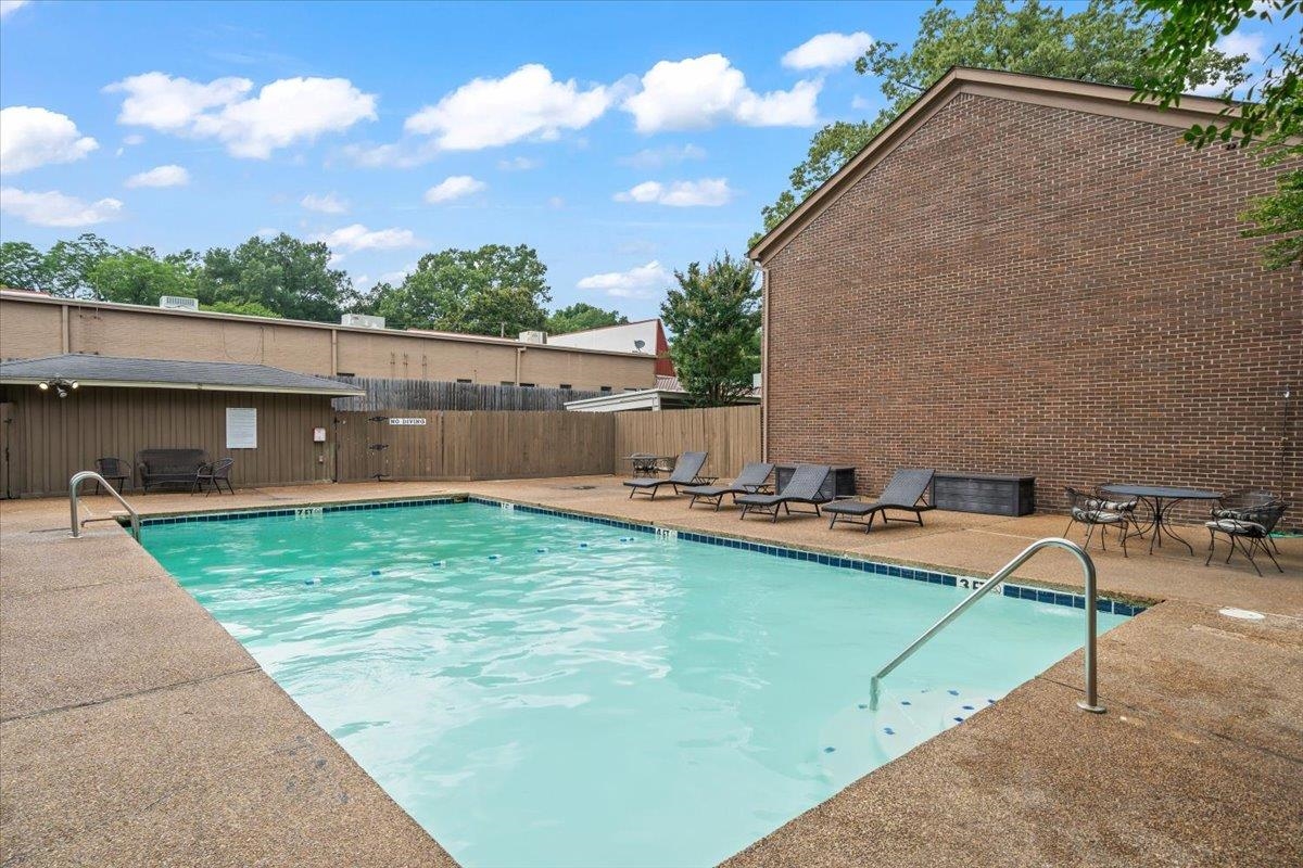 875 South Yates Road, Unit 4 Memphis, TN 38120 - Photo 6 of 25 Community pool with a patio area