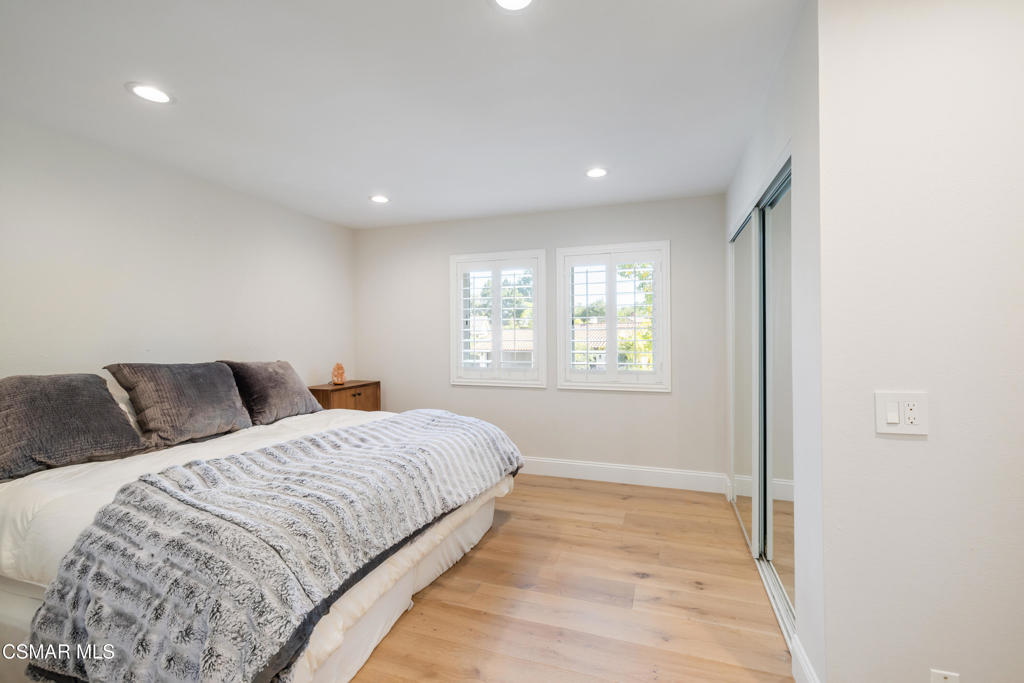 885 Rim Crest Drive Westlake Village, CA 91361 - Photo 20 of 35 a bedroom with a large bed and a window