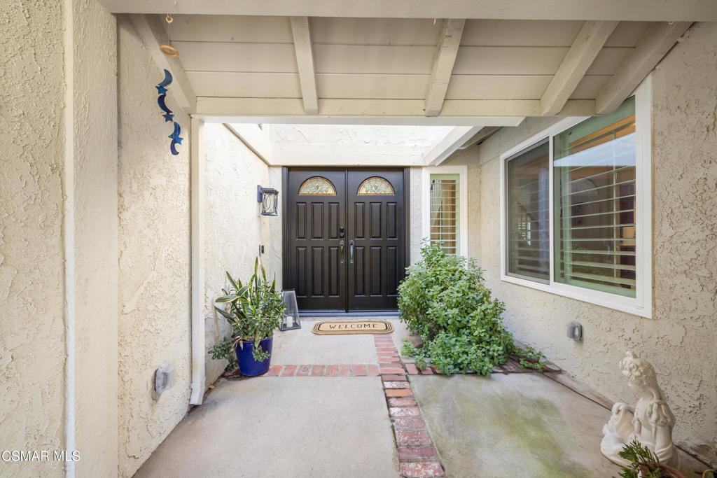 885 Rim Crest Drive Westlake Village, CA 91361 - Photo 2 of 35 a front view of a house with a yard