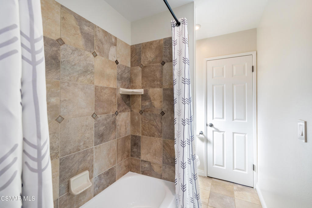 885 Rim Crest Drive Westlake Village, CA 91361 - Photo 22 of 35 a bathroom with a shower and a toilet