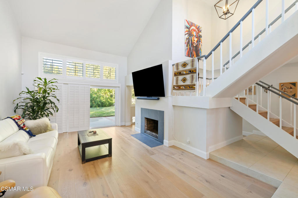 885 Rim Crest Drive Westlake Village, CA 91361 - Photo 3 of 35 a living room with furniture fireplace and flat screen tv