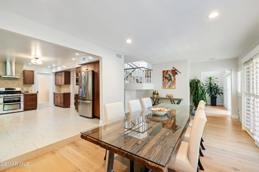 885 Rim Crest Drive Westlake Village, CA 91361 - Photo 7 of 35 a living room with furniture and kitchen view with wooden floor