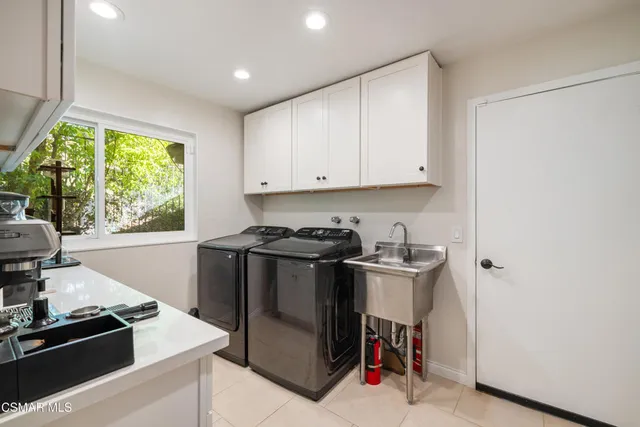 a kitchen with a stove and a microwave