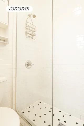 a bathroom with a toilet and a bathtub