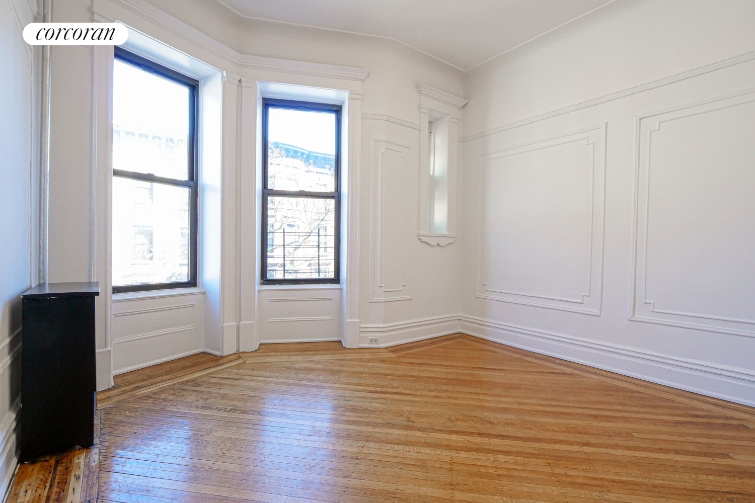 524 5th Street Brooklyn, NY 11215 - Photo 5 of 23 an empty room with wooden floor and windows