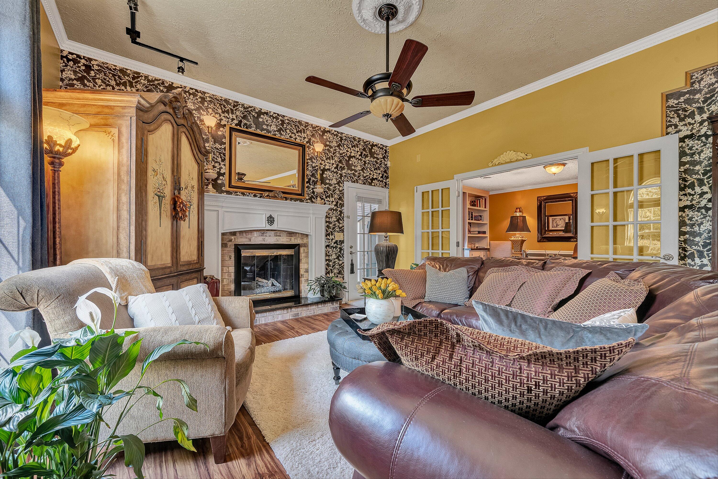4723 Norwood Street Southwest Roanoke, VA 24018 - Photo 12 of 84 a living room with furniture and a fireplace