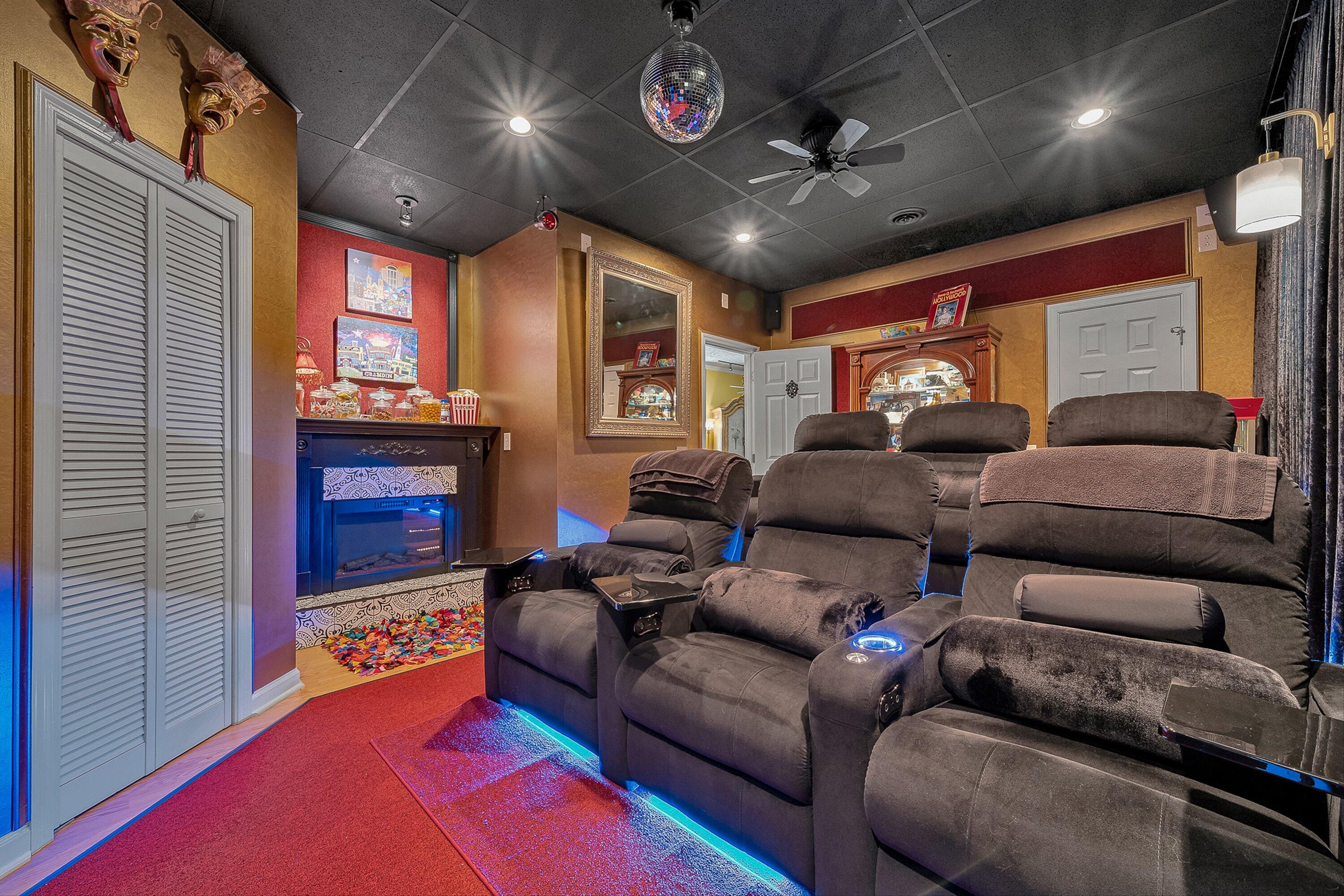 4723 Norwood Street Southwest Roanoke, VA 24018 - Photo 19 of 84 a living room with furniture a fireplace and a projector