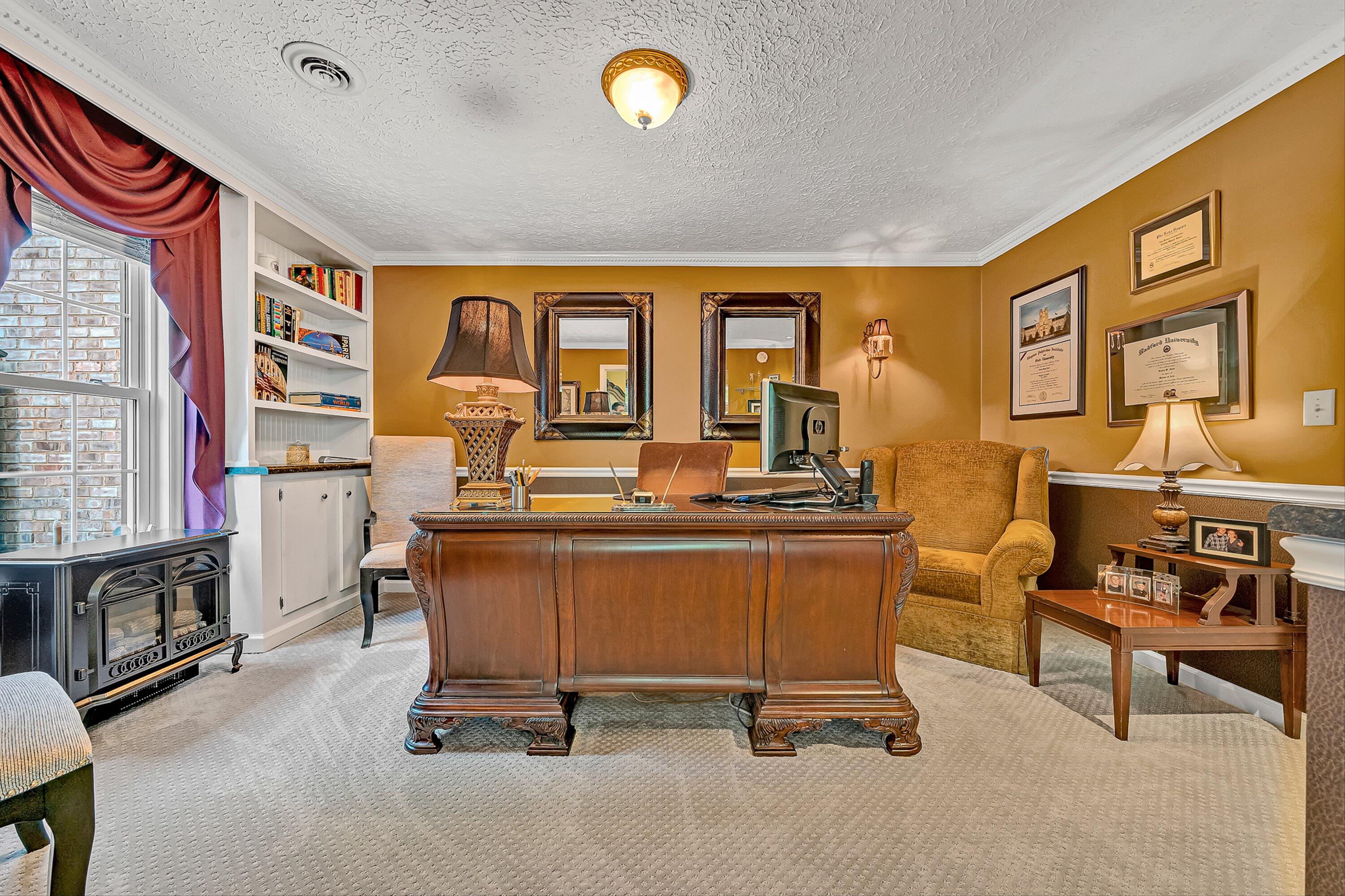 4723 Norwood Street Southwest Roanoke, VA 24018 - Photo 20 of 84 a view of a livingroom with furniture and a fireplace